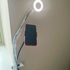 A Phone Stand with a supplementary Blue Light