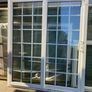 White uPVC sliding patio doors with Georgian bars Image 2