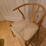Set of two Meadows and Byrne oak wishbone chairs Image 2