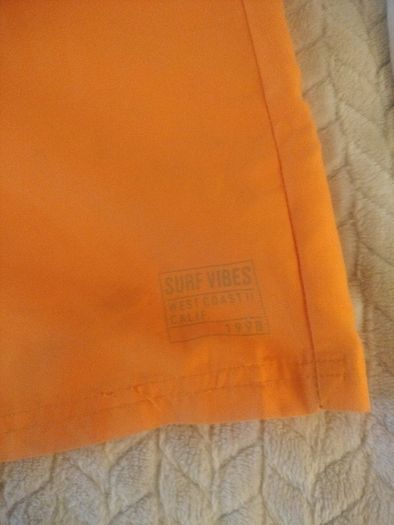 Boys orange swim shorts