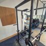 Home Gym set up w/ plates and kettlebells Image 9