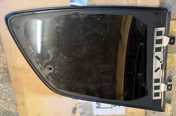 Mazda RX-8 tinted rear left side glass