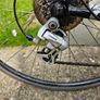 Racing  bike, helmet,  and pedals Image 6