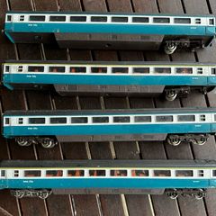 Some random parts for hornby trains. Included is 2 British rail coaches in need of repair. A Harry Potter coach. Also various goods trucks