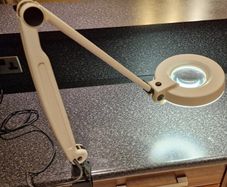 Waldmann Magnifier Luminaire on Swivel Arm