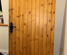 3 wooden pine doors