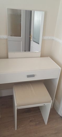 Dressing table with seat and mirror