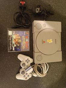 Playstation 1 with controller and game