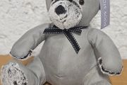 Adorable grey teddy bear doorstop