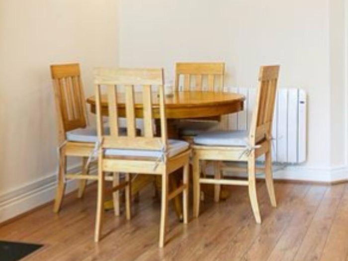 Round solid pine dining table with 5 chairs