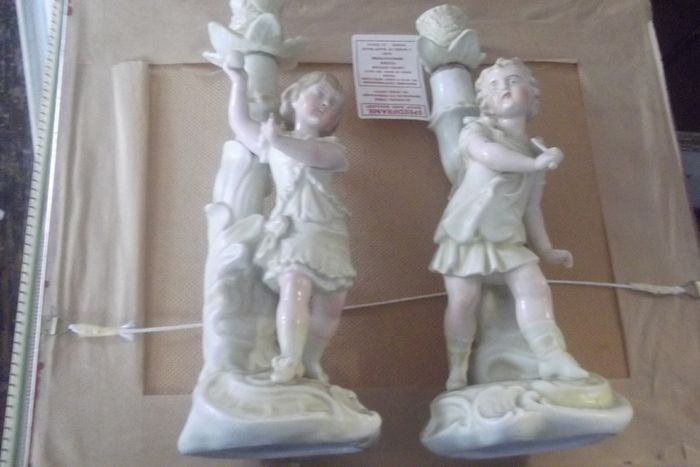 2 antique candle holder  figurine of tennis players date 1890