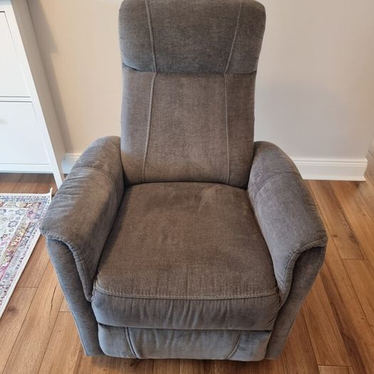 Swivel rocker reclining armchair