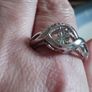 A 925 sterling silver ring with a floating diamond centerpiece. Image 6