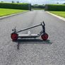 Nine bot e scooter with leds lights on the bottom of the frame. It's able to fold to make it easy to transport Image 8