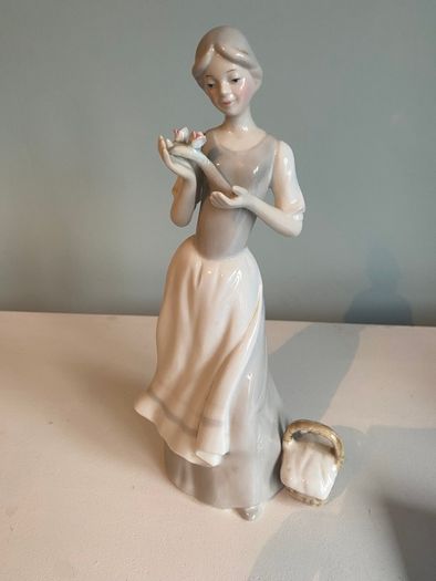 Porcelain 10 inch  figurine of a lady
