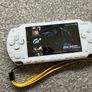 Modded Sony White PSP 1000 with Over 100 Games with Case and Charger. Image 5