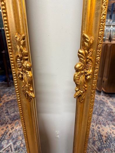 Pair of French Giltwood & Plaster Louis XVI Style Figural Beveled Mirrors