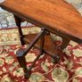 Early 20th Century solid oak gate leg drop leaf table. Image 7