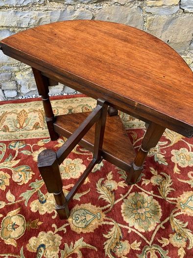 Early 20th Century solid oak gate leg drop leaf table.