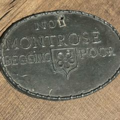 Antique begging badge