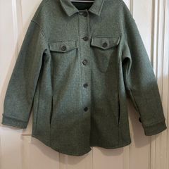 green coat from Dunnes