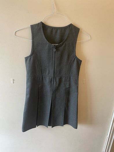 Dunnes grey pinafore (as new) age 8-9