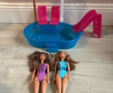 Barbie pool set plus two dolls