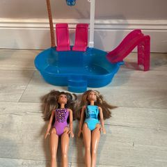 Barbie pool set plus two dolls