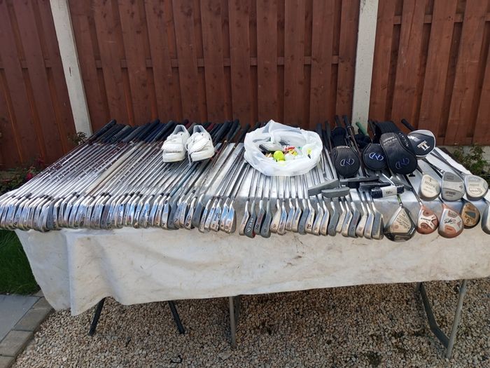 A selection of golf clubs and bags. All right handed clubs.