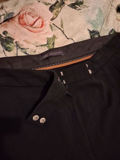 Black bootcut trousers