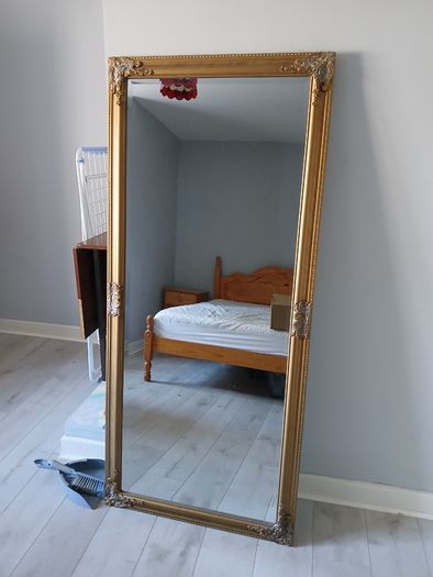 Large gold effect distressed effect mirror