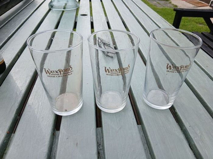 Three Wexford pint glasses