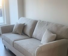 4 seater couch and footstool