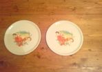 Two large pizza plats