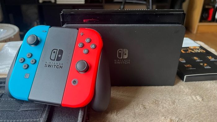 Nintendo Switch OLED, Used Twice + New Case + 4 Screen Protectors