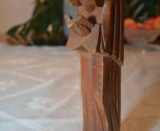 Vintage carved figurine of a reading monk