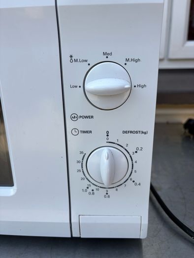 PowerPoint Microwave Old & rusty but Can be seen working.