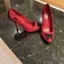 Red high heeled shoes with black lace Image 4