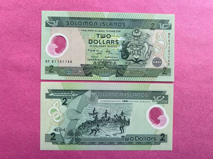Solomon Islands  2 Dollars  Pick 23a  Polymer / Plastic  Commemorative Issue  . ( Uncirculated )