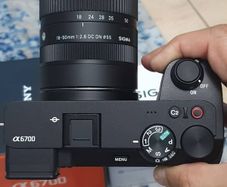 Sony a6700 along with Sigma 18-50mm lens