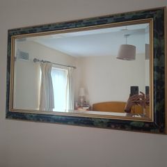Mirror with black & green surround