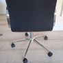 Black ribbed office chair with chrome base Image 3
