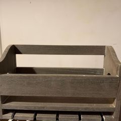 Wine shelf with glass holder