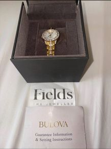 women Bulova gold watch