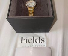 women Bulova gold watch