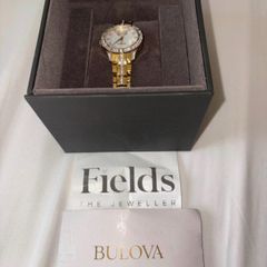 women Bulova gold watch