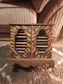 unique hand painted cd cabinet