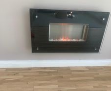 Modern wall-mounted electric fire.
