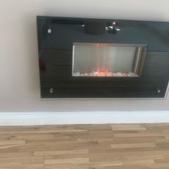 Modern wall-mounted electric fire.