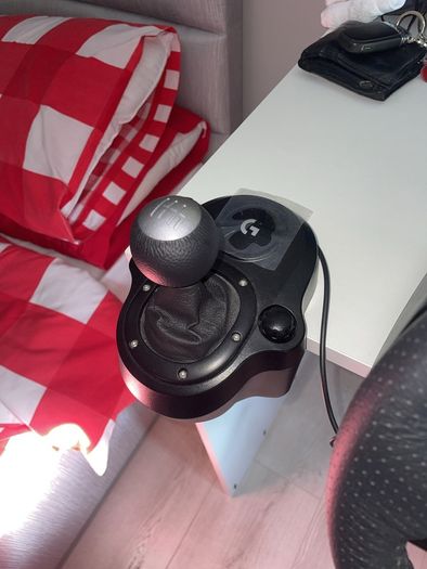 Logitech G29 steering wheel, pedals and shifter.